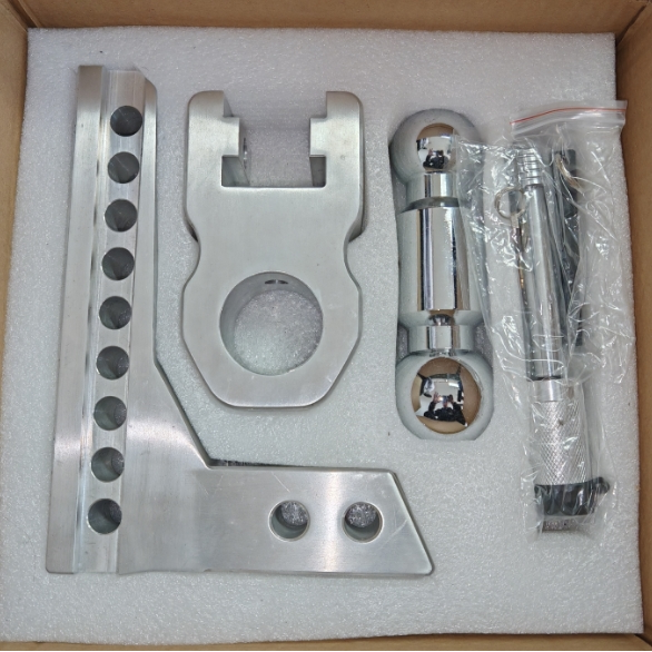 Side view demonstrating the adjustable length of the 8-inch towing arm, showing its range of motion