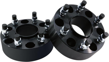 Comparison showing a set of four new Vypart wheel spacers next to old, corroded or worn spacers